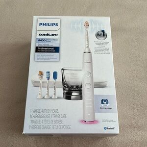 NWOT Philips Sonicare White Electric Toothbrush.